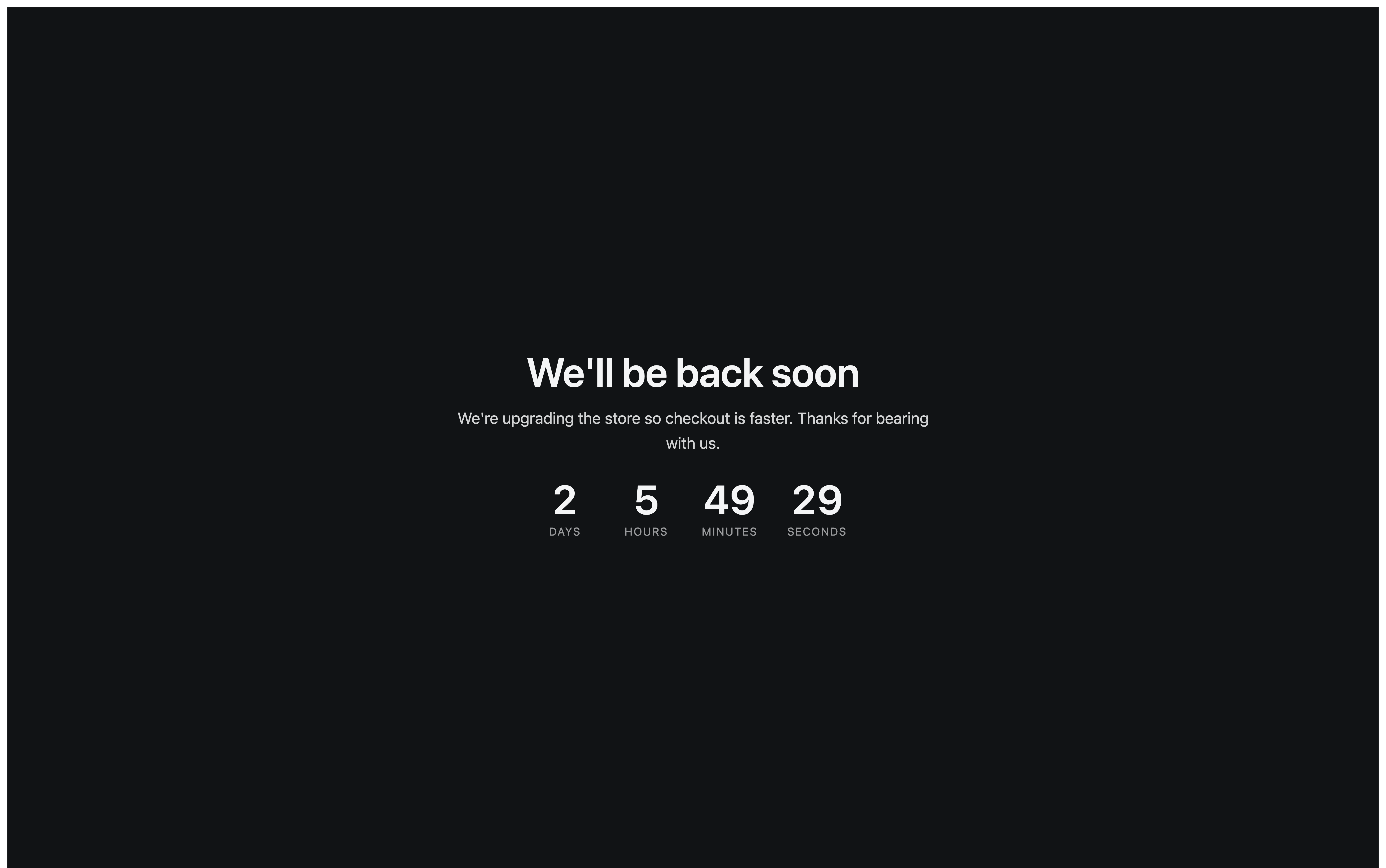A live maintenance page on a near-black background: the heading We'll be back soon, a short message explaining the store is being upgraded, and a countdown showing days, hours, minutes and seconds until the store reopens.